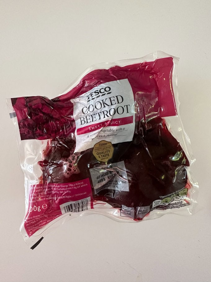 A packet of cooked beetroot.